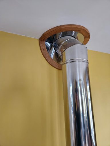 Oak / stainless flue trim